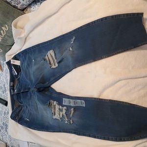 Brand new Old Navy jeans. Rips at knees. Darker wash. Has all tags attached.